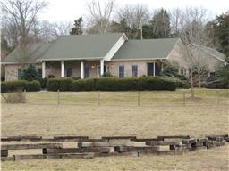 259 Hopkins Road Pulaski, TN 38478 - Photo 1 of 20 View of home across riding arena
