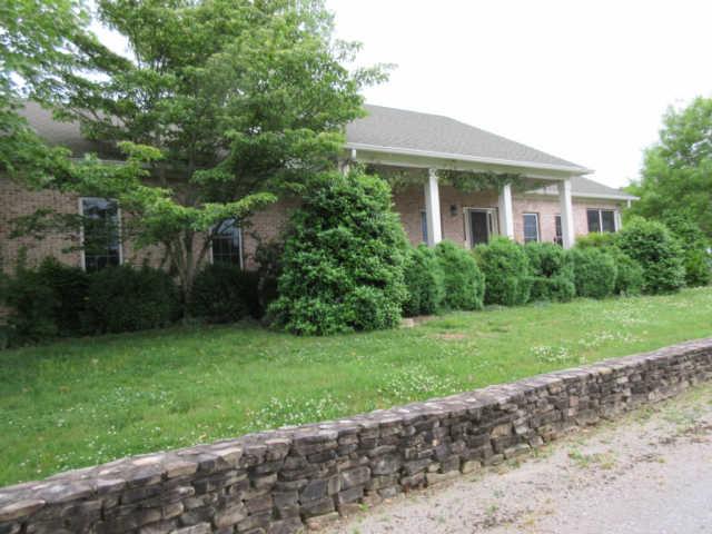 259 Hopkins Road Pulaski, TN 38478 - Photo 2 of 20 Custom built home with hand stacked stone wall