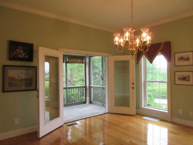 259 Hopkins Road Pulaski, TN 38478 - Photo 12 of 20 Formal dining room with access to screened in porch