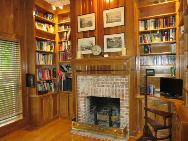 259 Hopkins Road Pulaski, TN 38478 - Photo 16 of 20 Library/Den with fireplace and numerous built in bookshelves