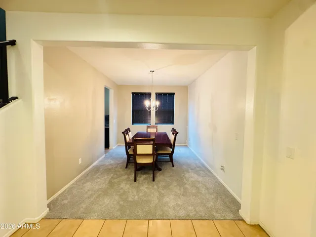 a living room with a couch and a table