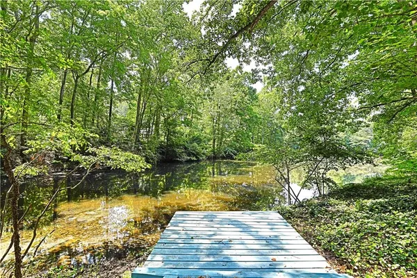 a view of swimming pool from a yard