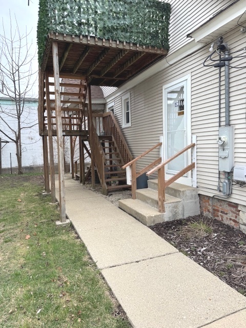 43 West Church Street, Unit 100 Sandwich, IL 60548 - Photo 17 of 22 a view of a backyard