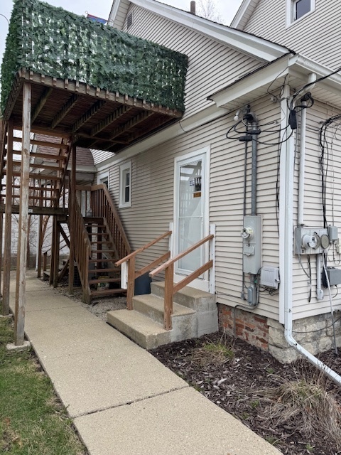 43 West Church Street, Unit 100 Sandwich, IL 60548 - Photo 18 of 22 a view of a garage with wooden floor