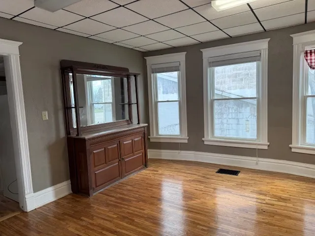 a room with wooden floors and walls