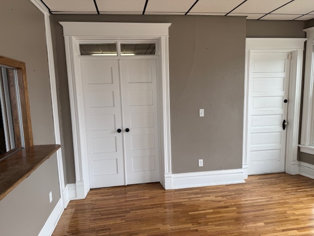 43 West Church Street, Unit 100 Sandwich, IL 60548 - Photo 5 of 22 a view of an empty room with closet and a window