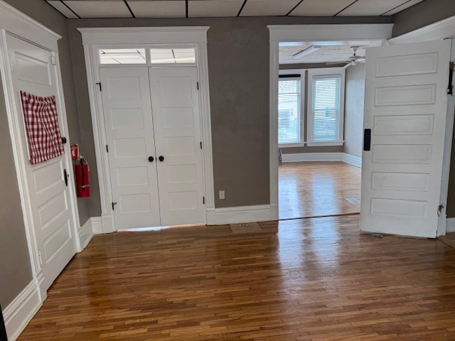 43 West Church Street, Unit 100 Sandwich, IL 60548 - Photo 7 of 22 a view of hallway with wooden floor