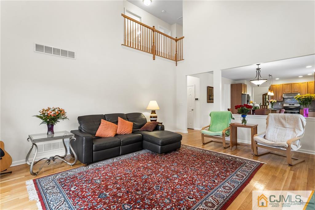 104 Mundy Avenue Edison, NJ 08820 - Photo 18 of 55 a living room with furniture and a rug