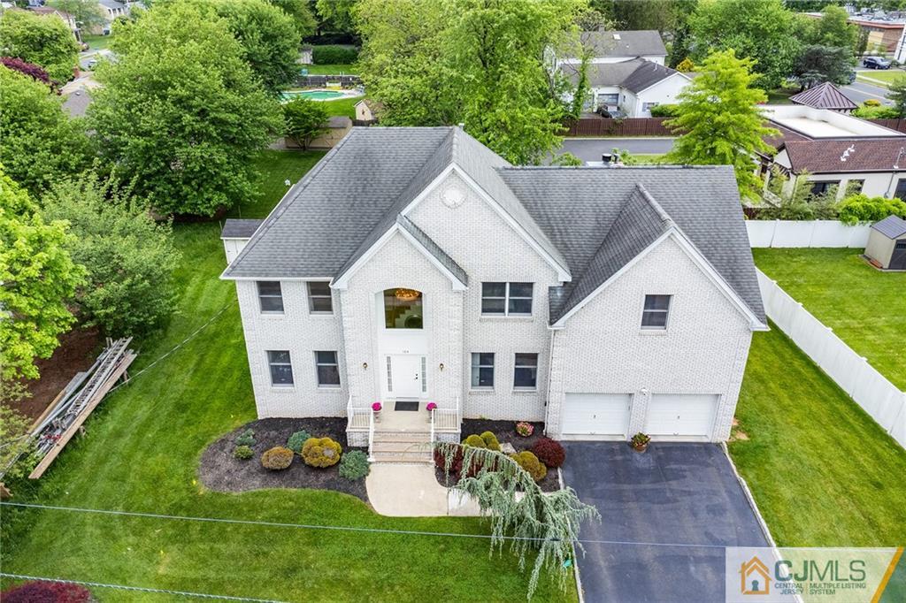 104 Mundy Avenue Edison, NJ 08820 - Photo 2 of 55 a view of house with backyard space and sitting area