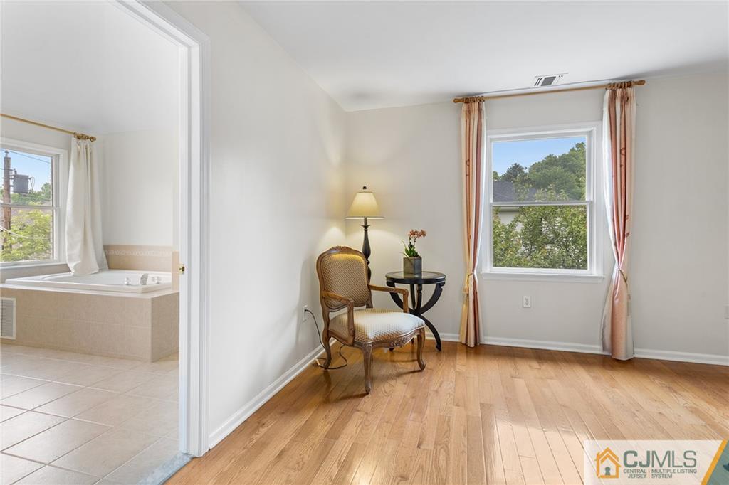 104 Mundy Avenue Edison, NJ 08820 - Photo 24 of 55 a living room with furniture and a window