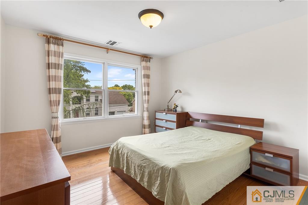 104 Mundy Avenue Edison, NJ 08820 - Photo 29 of 55 a bedroom with a bed and a window