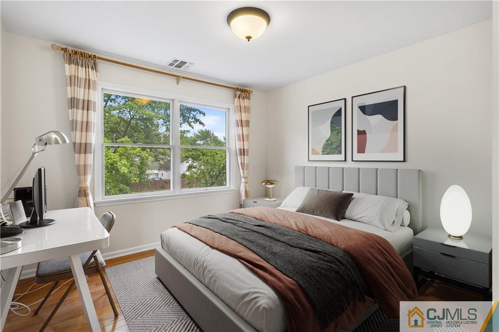 104 Mundy Avenue Edison, NJ 08820 - Photo 34 of 55 a bedroom with a bed and a window