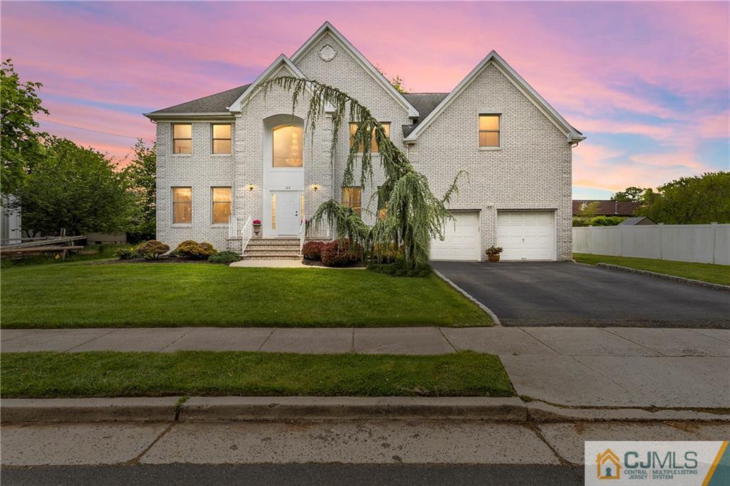 104 Mundy Avenue Edison, NJ 08820 - Photo 41 of 55 a front view of a house with a yard