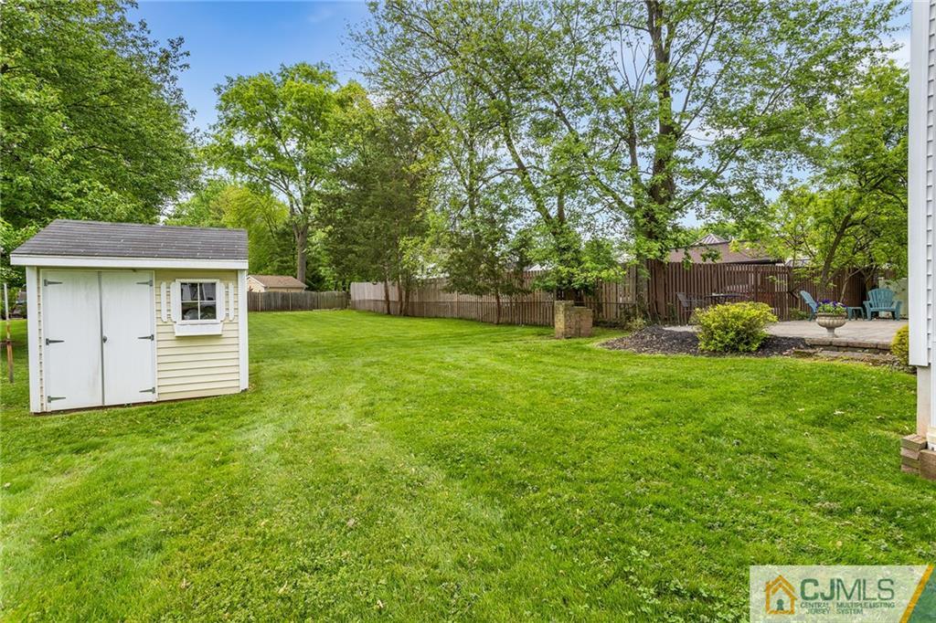 104 Mundy Avenue Edison, NJ 08820 - Photo 44 of 55 a view of a house with backyard and a tree