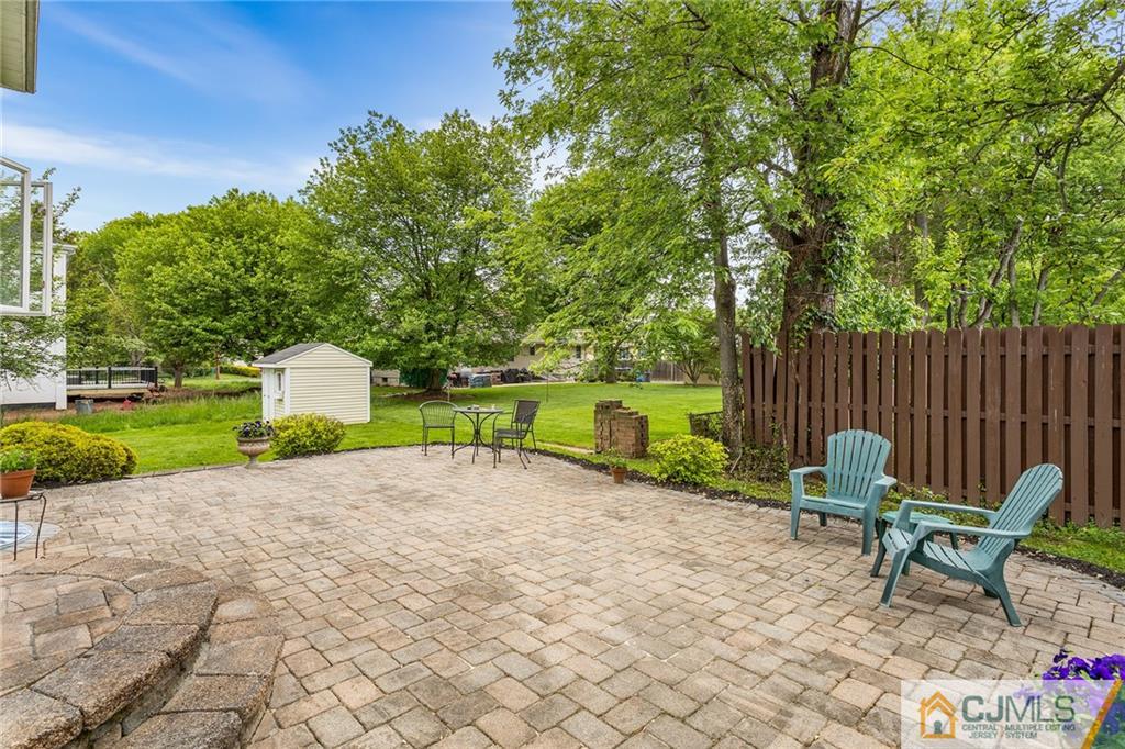 104 Mundy Avenue Edison, NJ 08820 - Photo 45 of 55 a white bench sitting in the middle of a park