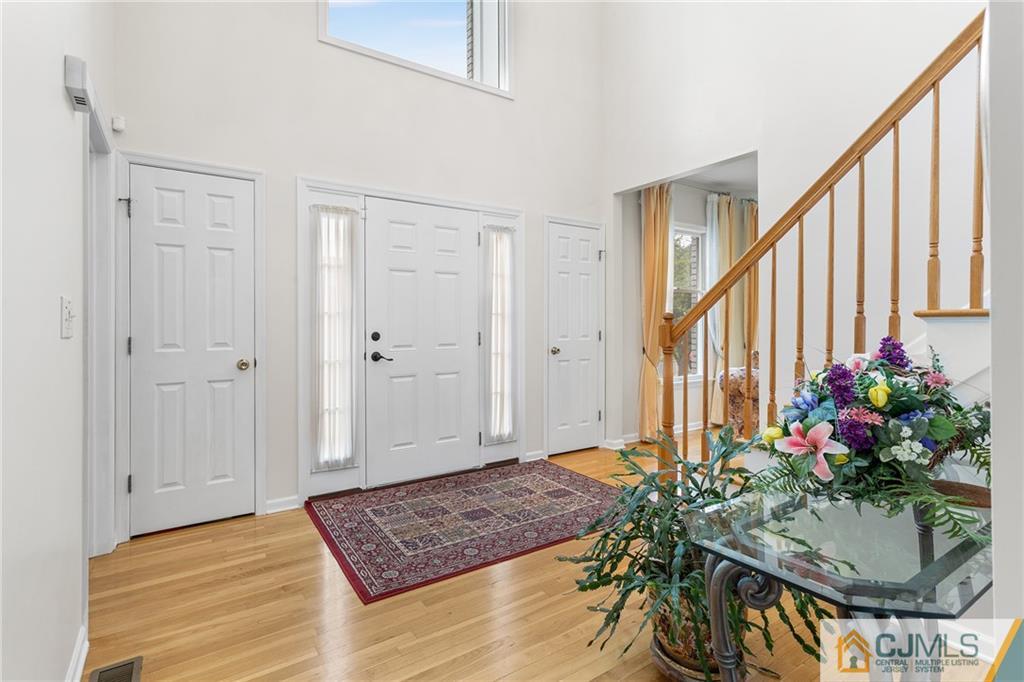 104 Mundy Avenue Edison, NJ 08820 - Photo 7 of 55 a view of an entryway and flowers