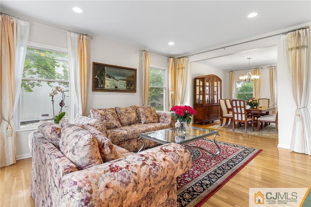 104 Mundy Avenue Edison, NJ 08820 - Photo 8 of 55 a living room with furniture and a large window