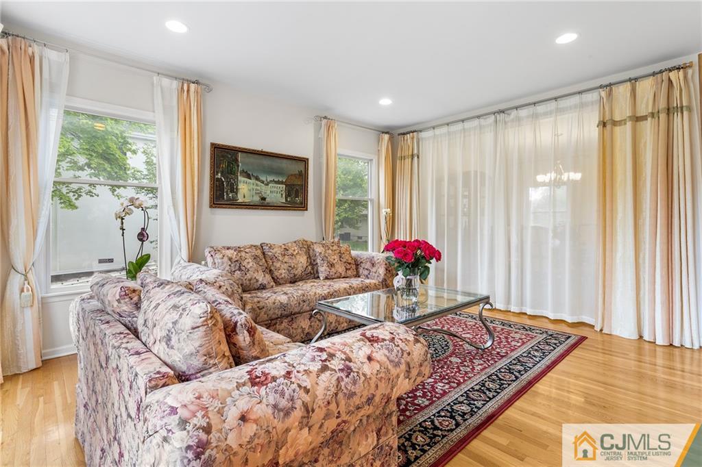 104 Mundy Avenue Edison, NJ 08820 - Photo 9 of 55 a living room with furniture and a large window