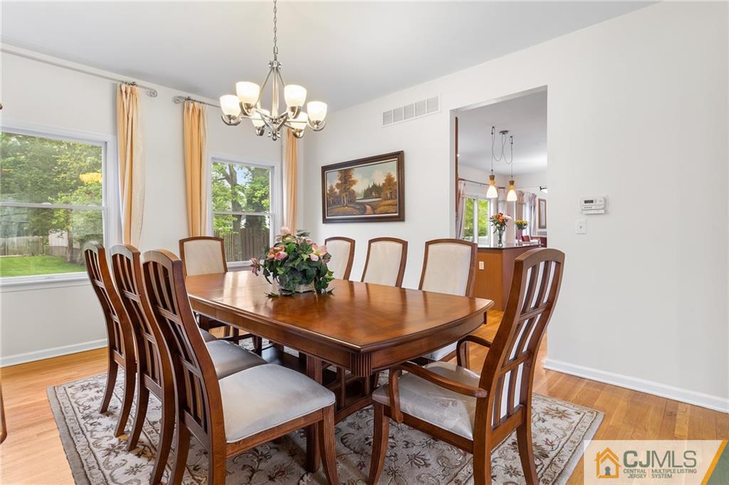 104 Mundy Avenue Edison, NJ 08820 - Photo 10 of 55 a view of a dining room with furniture window and outside view