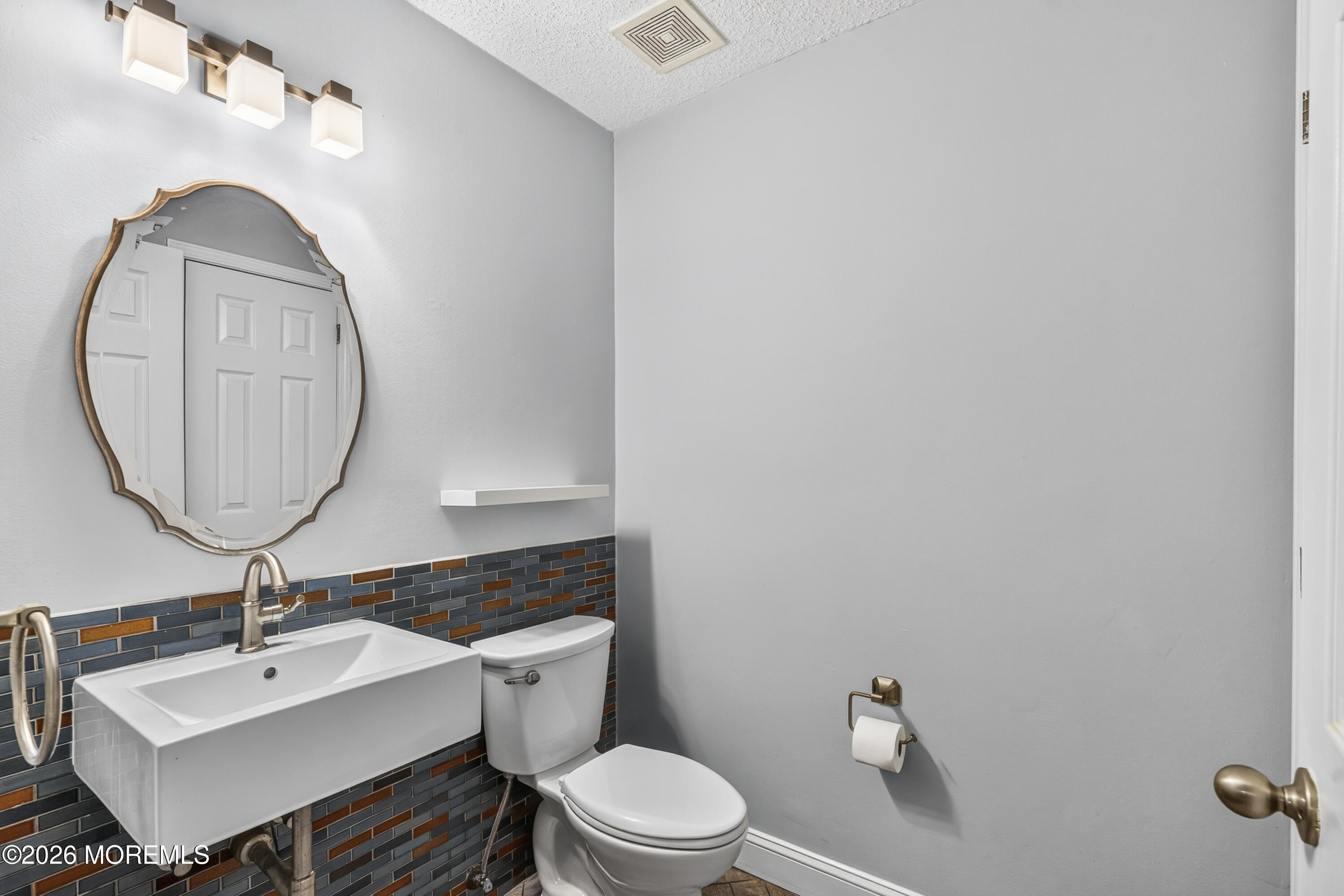 63 Winged Foot Court Howell, NJ 07731 - Photo 9 of 34 First floor bathroom