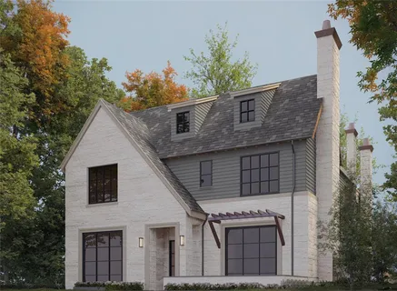 a front view of a house with a tree