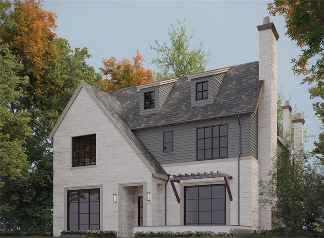 a front view of a house with a tree