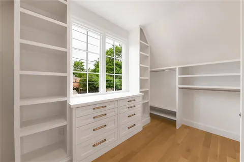 a room with cabinets and a window