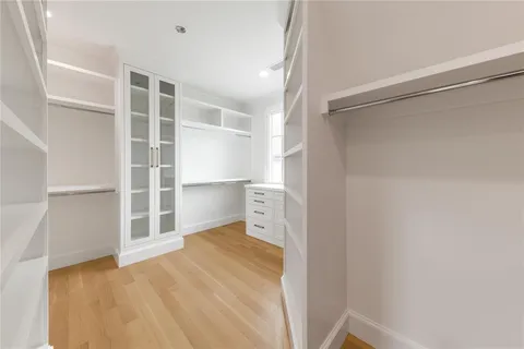 a view of an empty walk in closet