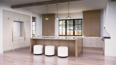a kitchen with kitchen island granite countertop a stove a sink and white cabinets with wooden floor