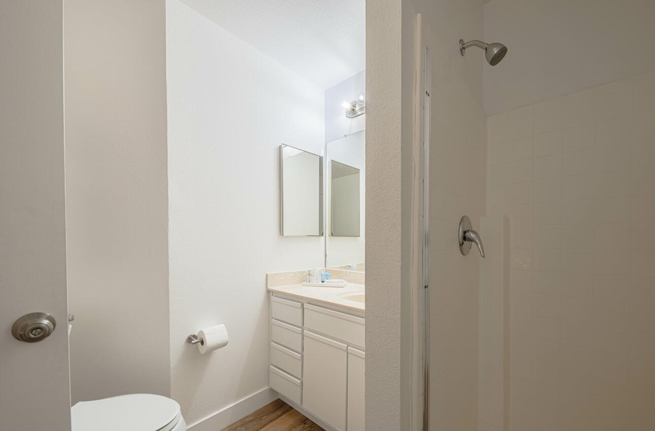 640 Pheasant Ridge Road Monterey, CA 93940 - Photo 19 of 27 a bathroom with a sink a toilet and shower