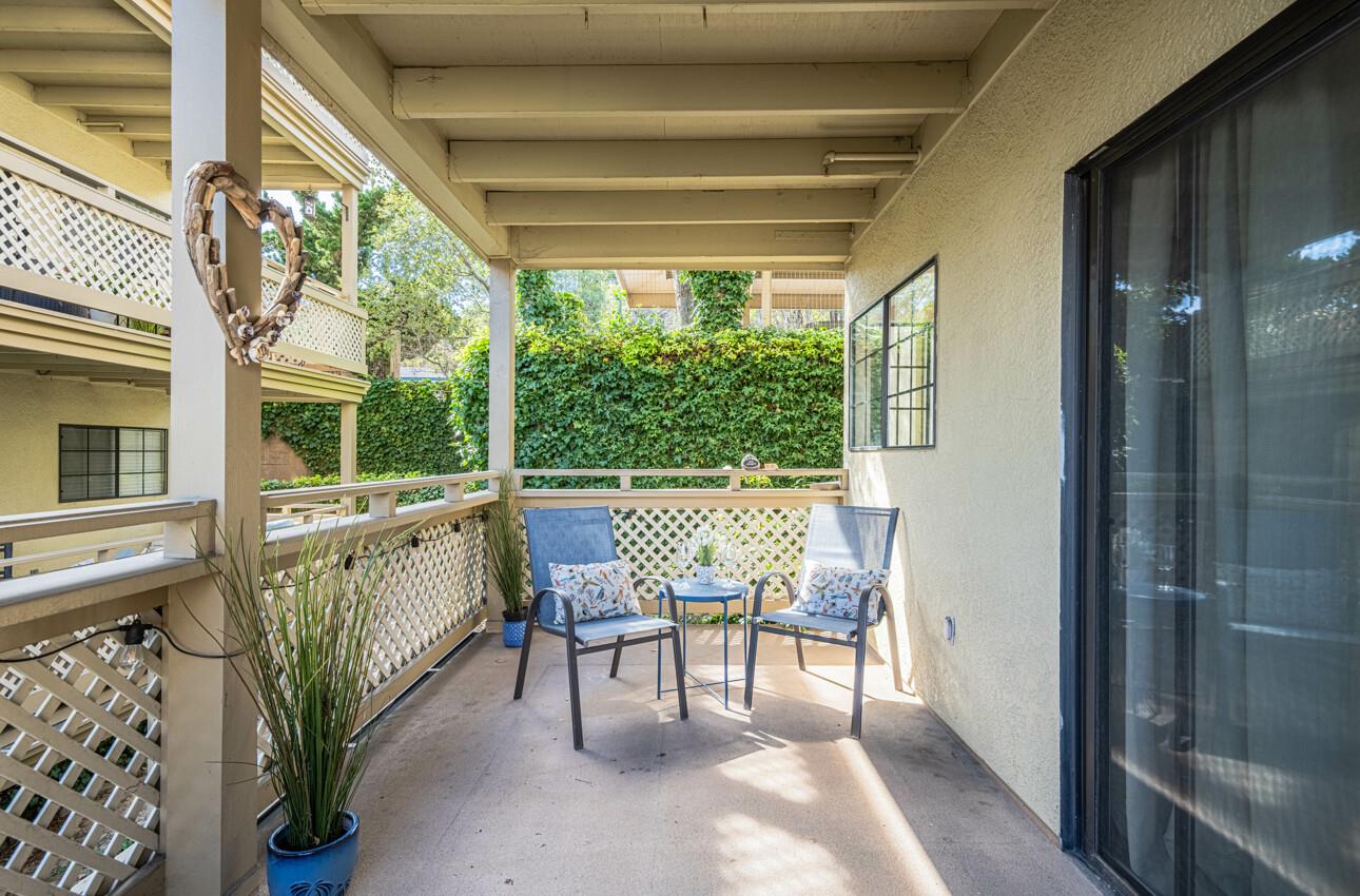 640 Pheasant Ridge Road Monterey, CA 93940 - Photo 4 of 27 a balcony with furniture and large window