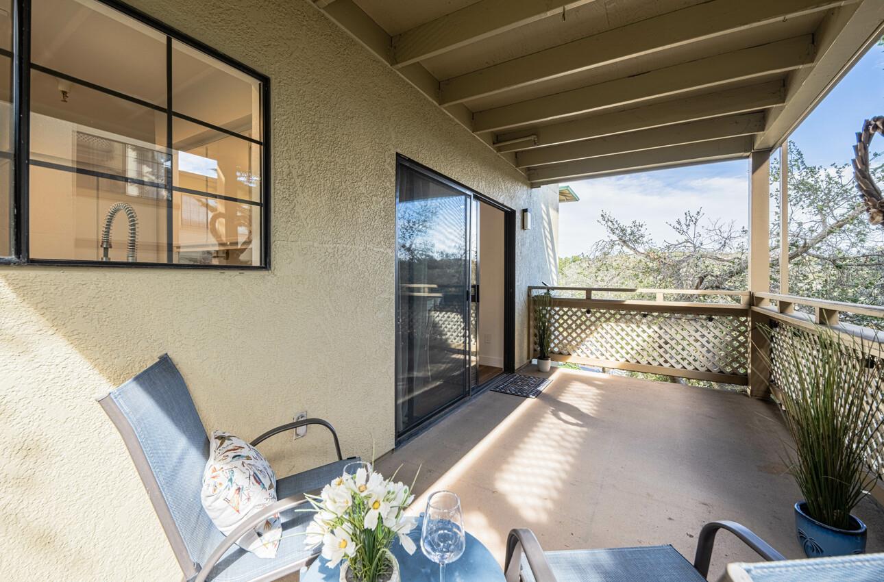 640 Pheasant Ridge Road Monterey, CA 93940 - Photo 5 of 27 a bed sitting in a room next to a window