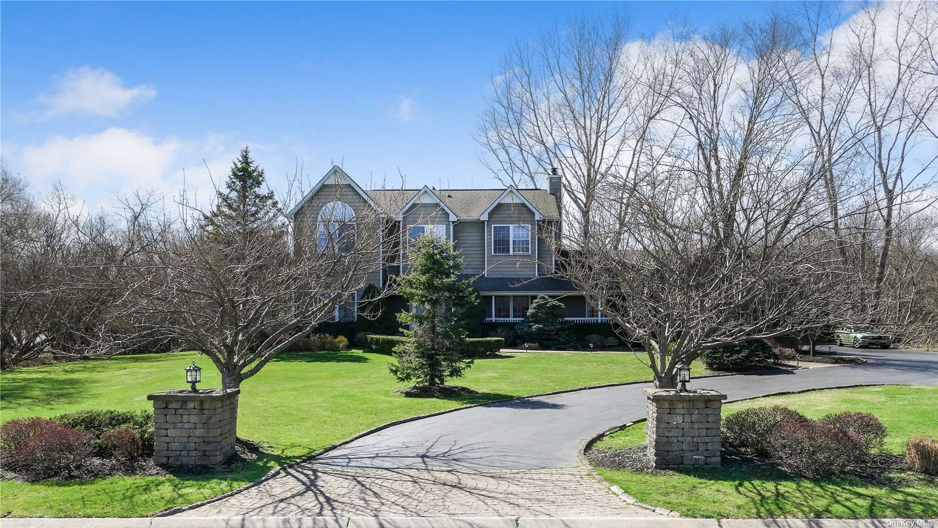 14 Jareds Path Brookhaven, NY 11719 - Photo 1 of 1 a front view of a house with garden and trees