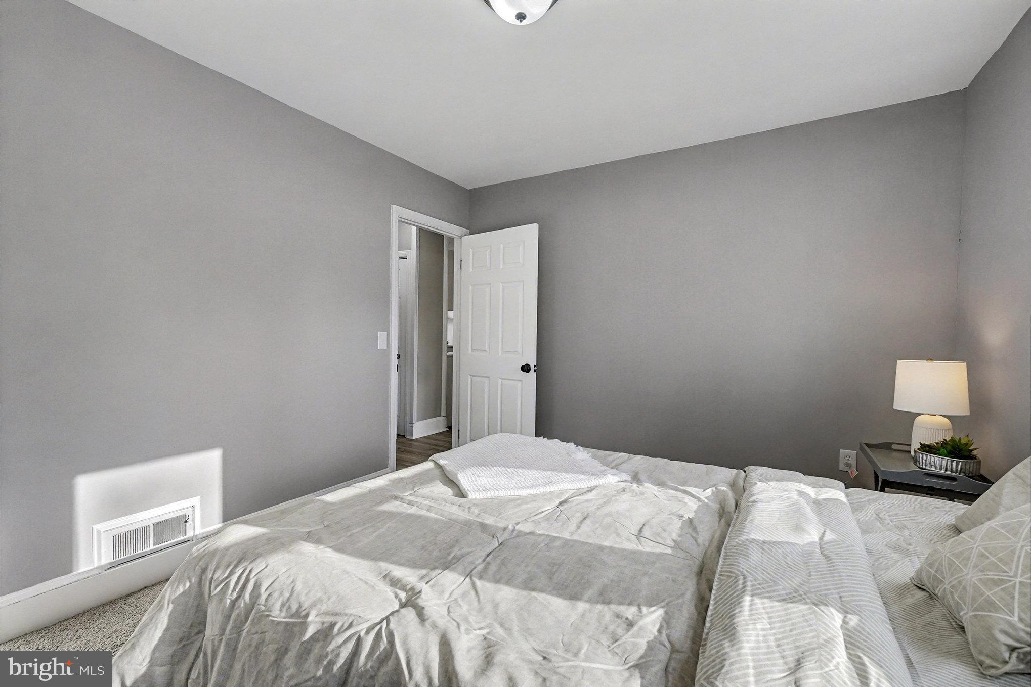 1219 Holloway Road Darlington, MD 21034 - Photo 13 of 30 Serene bedroom with soft gray tones.