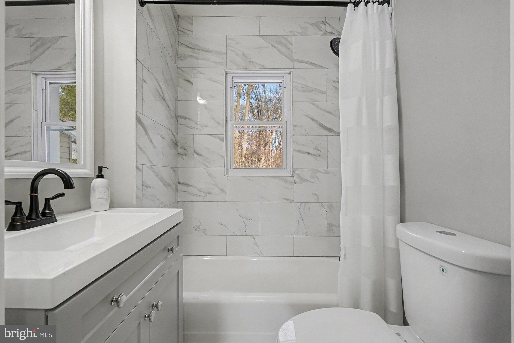 1219 Holloway Road Darlington, MD 21034 - Photo 19 of 30 New tile and accents. New water conserving toilet.