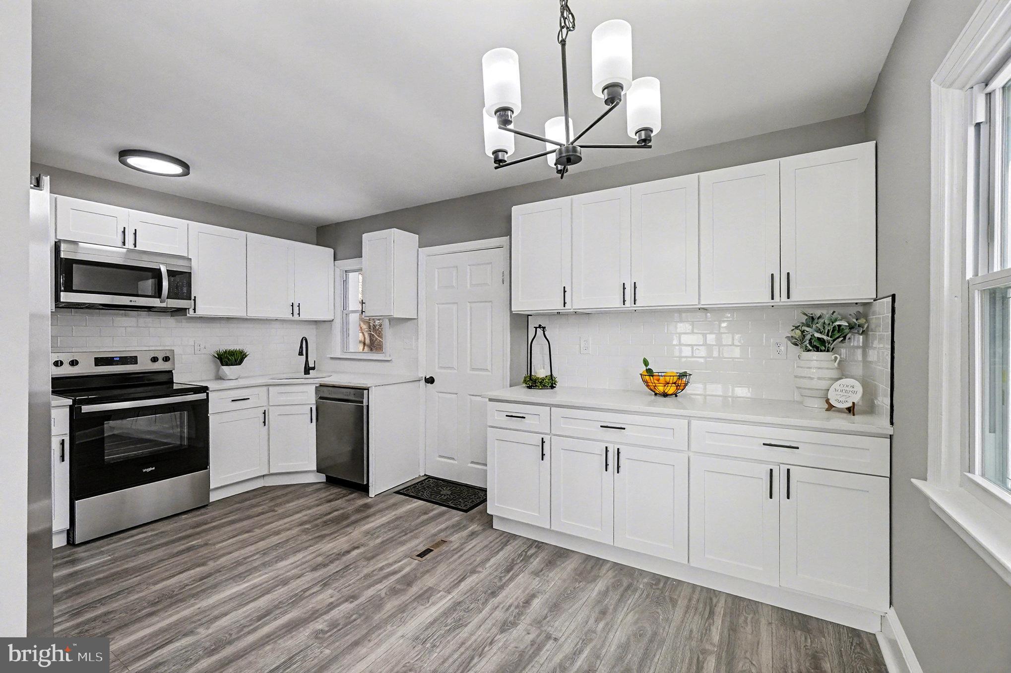1219 Holloway Road Darlington, MD 21034 - Photo 8 of 30 Kitchen with new cabinetry & granite countertops.
