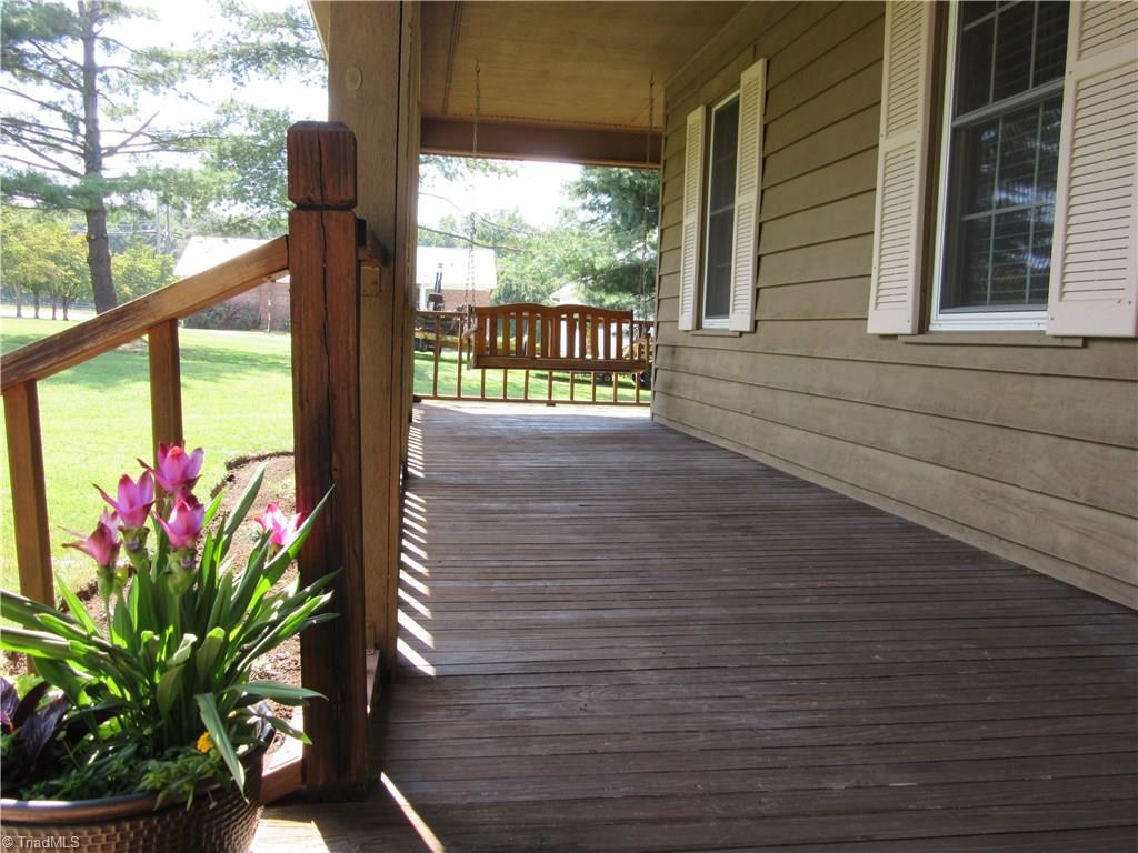 157 Old Farm Road Thomasville, NC 27360 - Photo 3 of 30 Enjoy the outdoors from the comfort of a front porch swing...
