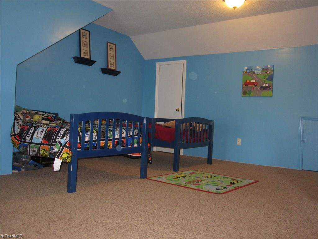 157 Old Farm Road Thomasville, NC 27360 - Photo 21 of 30 The bonus room located on the 2nd level could be a 4th bedroom, playroom, office, etc. This room is large!