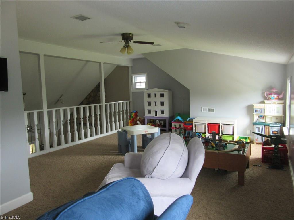 157 Old Farm Road Thomasville, NC 27360 - Photo 23 of 30 The upstairs loft space is bright and spacious!