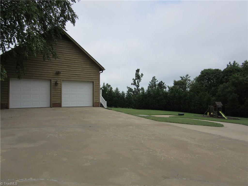 157 Old Farm Road Thomasville, NC 27360 - Photo 28 of 30 Side-entry Oversized 2-car Garage!