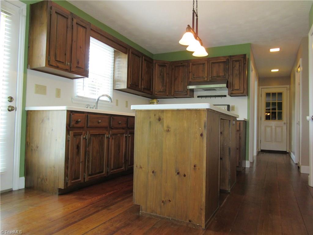 157 Old Farm Road Thomasville, NC 27360 - Photo 4 of 30 Creating masterpieces for the palate just got better! Ample counter/cabinet space, solid surface counters, island, brand new Stainless Steel Appliances (end of July 2016), hardwood floors, updated lighting! What more could you ask for!