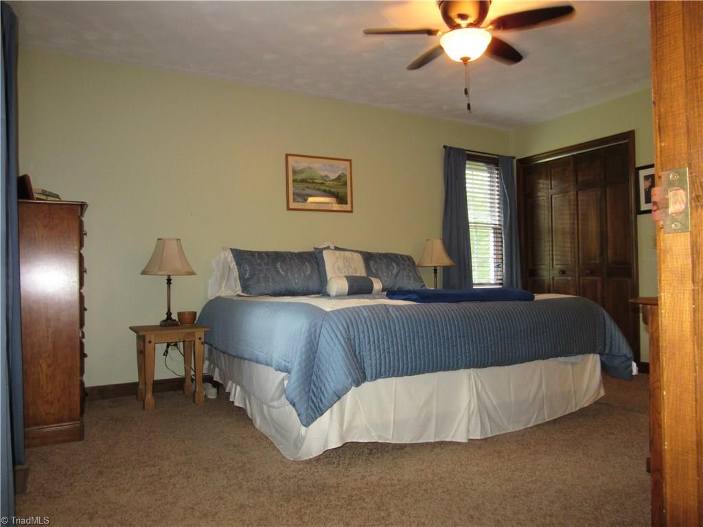 157 Old Farm Road Thomasville, NC 27360 - Photo 10 of 30 The main level master suite offers 2 closets and is large enough for all of your furniture!