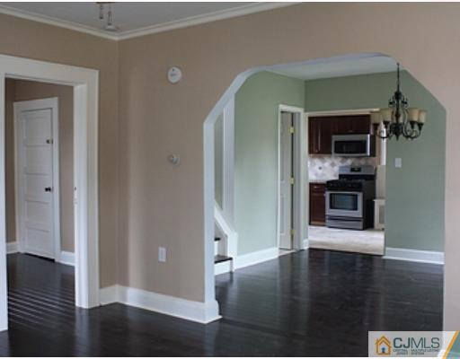 110 Parker Street Middlesex, NJ 08846 - Photo 2 of 8 a view of a living room with hardwood floor
