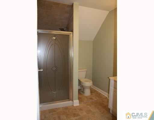 110 Parker Street Middlesex, NJ 08846 - Photo 4 of 8 a bathroom with a toilet and a shower