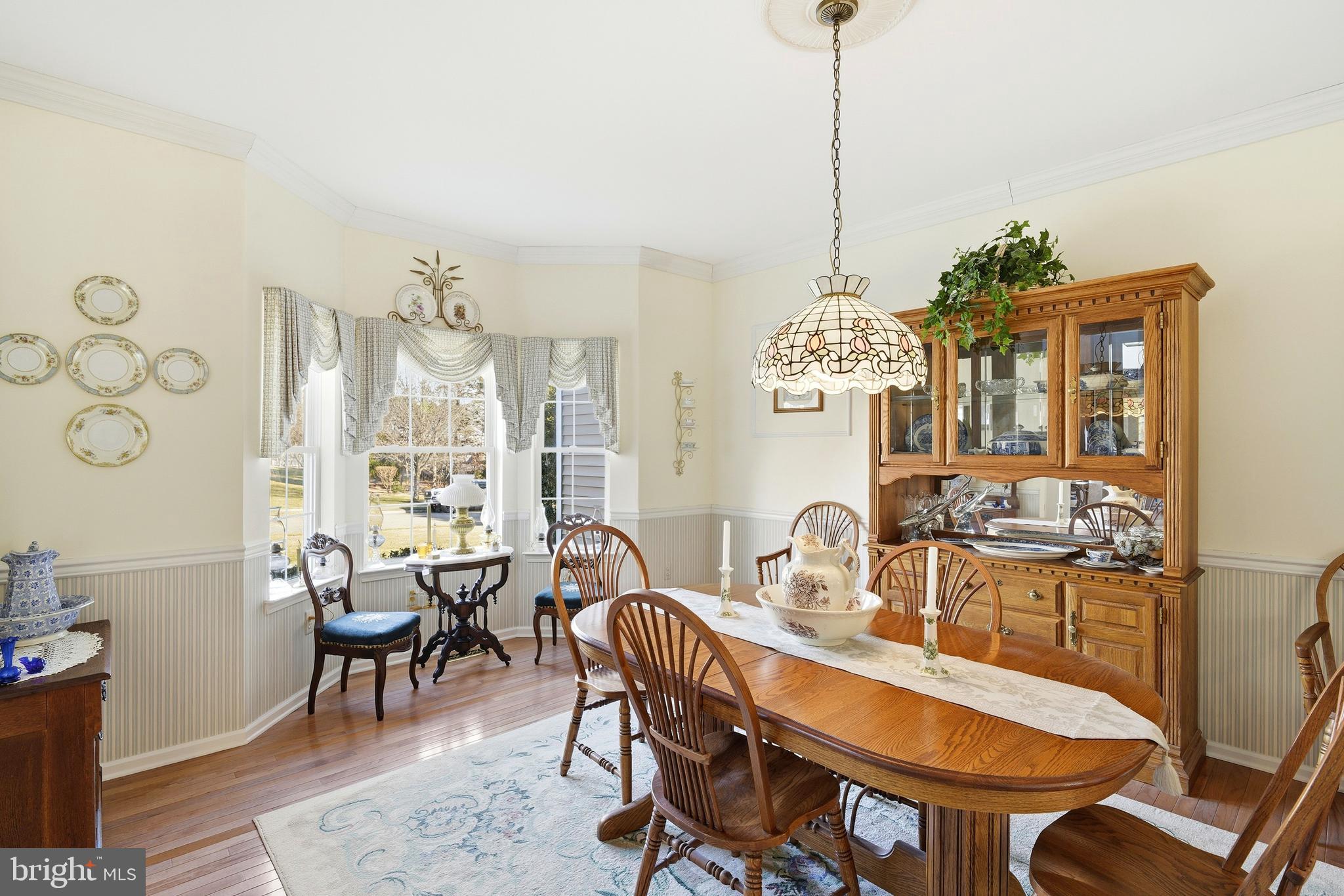 27 Rodeo Drive West Creek, NJ 08092 - Photo 12 of 52 a view of a dining room with furniture and chandelier