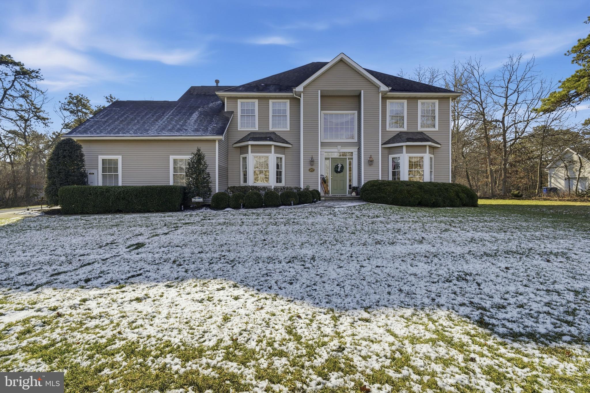 27 Rodeo Drive West Creek, NJ 08092 - Photo 2 of 52 a front of a house with a yard