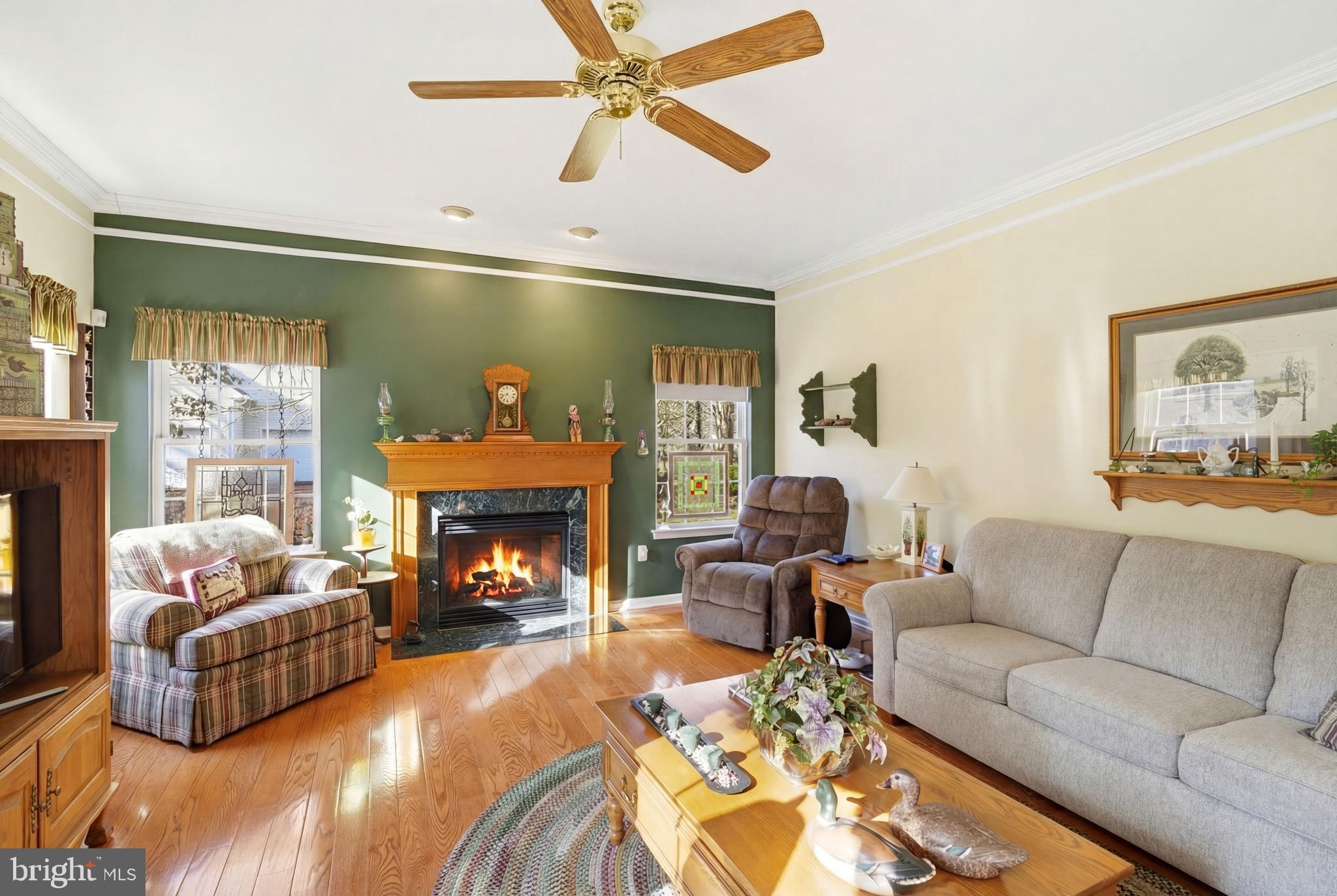 27 Rodeo Drive West Creek, NJ 08092 - Photo 23 of 52 a living room with furniture and a fireplace
