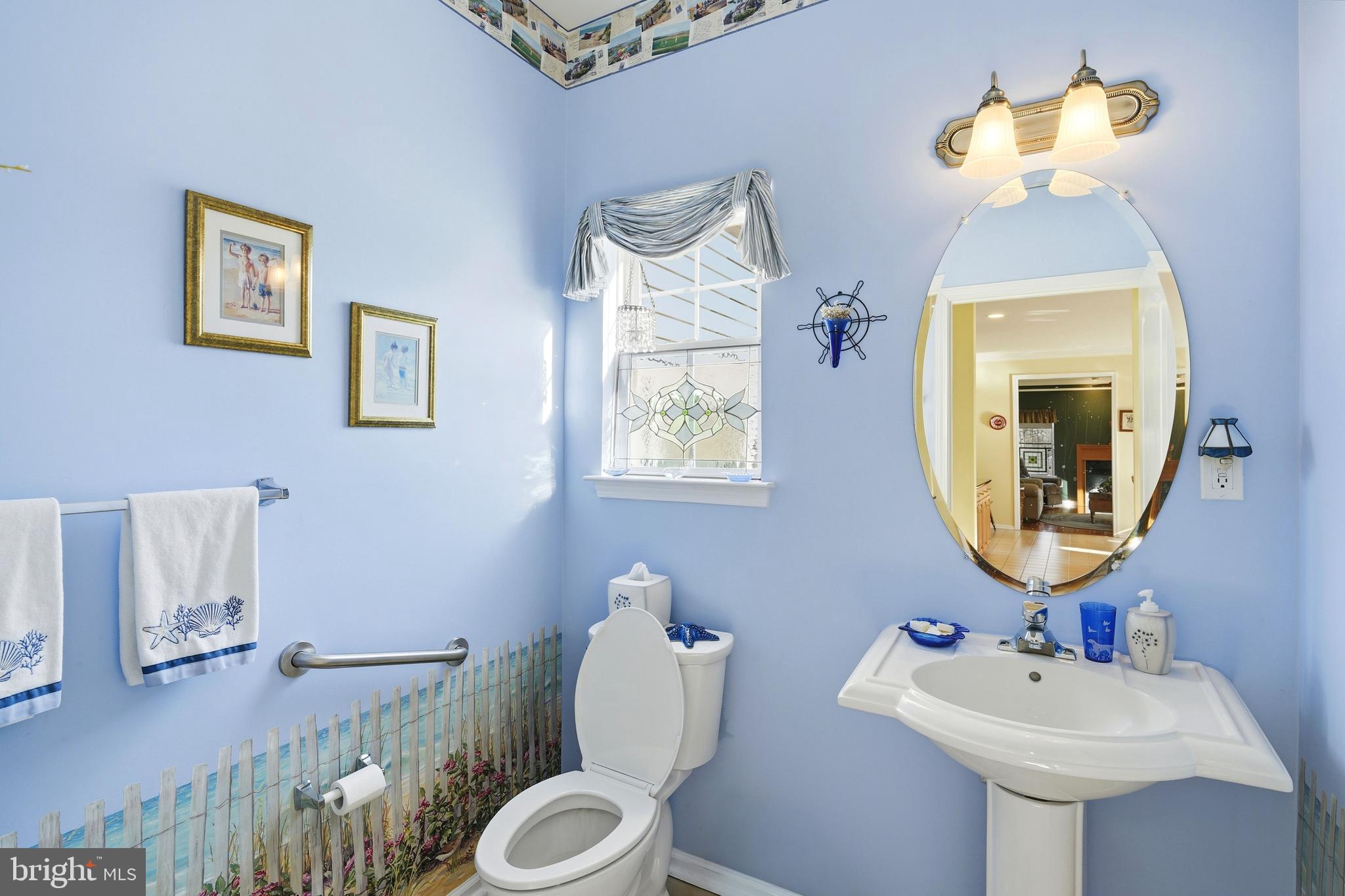 27 Rodeo Drive West Creek, NJ 08092 - Photo 27 of 52 a bathroom with a toilet sink and mirror