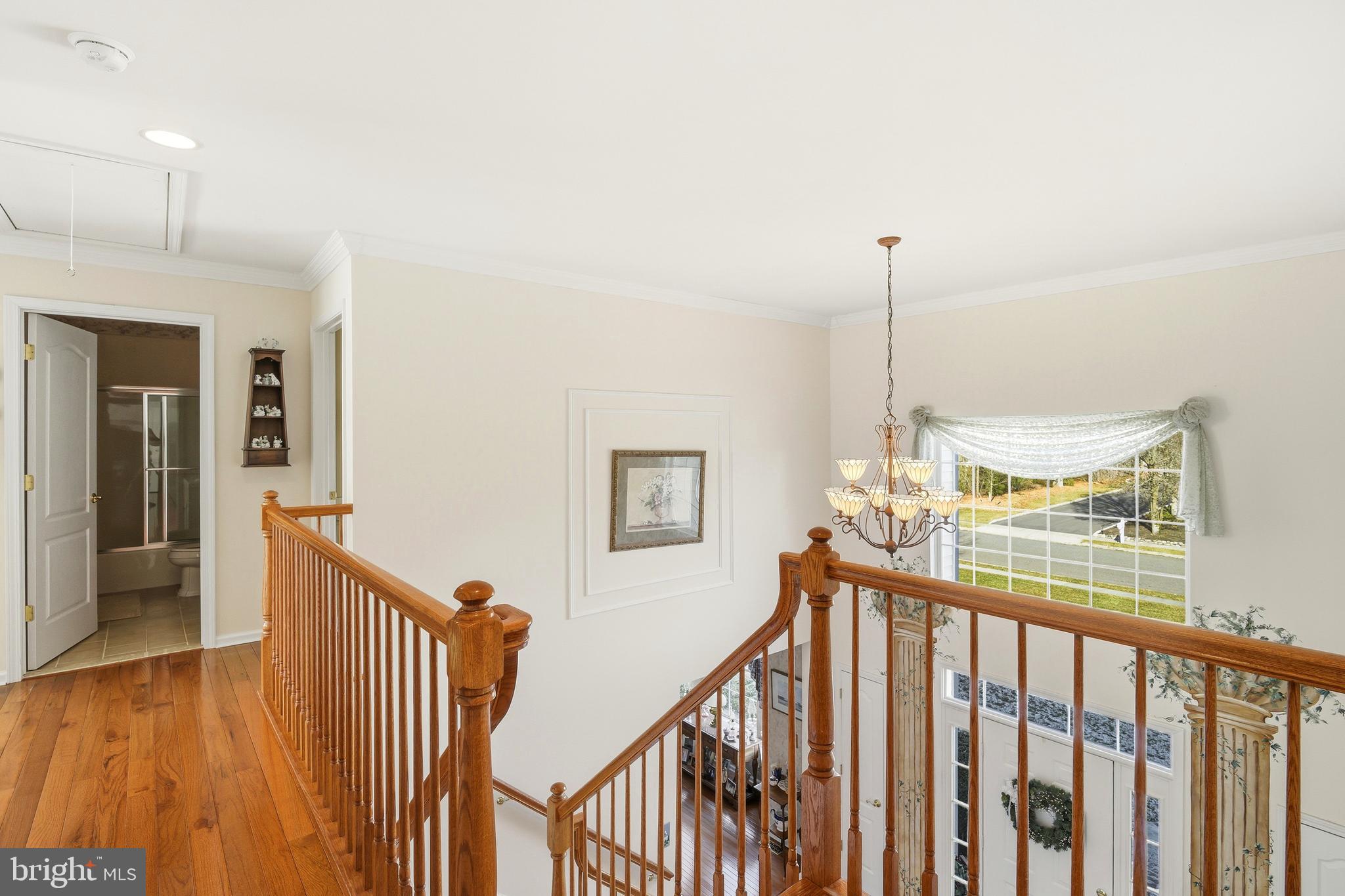 27 Rodeo Drive West Creek, NJ 08092 - Photo 28 of 52 a view of a hallway with a chandelier