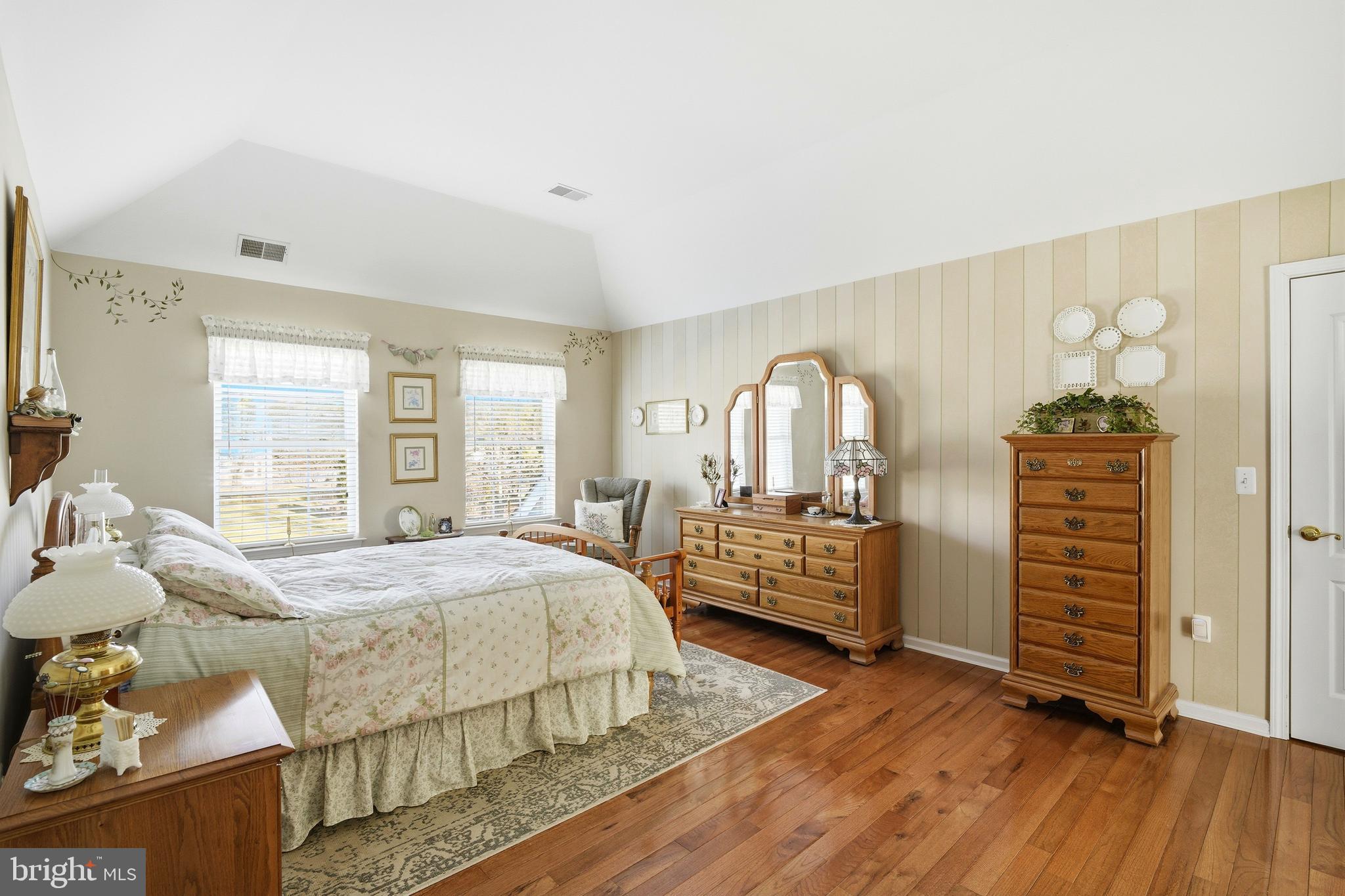 27 Rodeo Drive West Creek, NJ 08092 - Photo 34 of 52 a bedroom with a bed and wooden floor